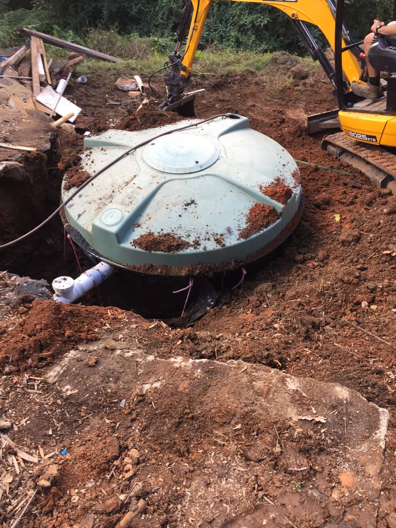 Wastewater treatment tank positioned during installation