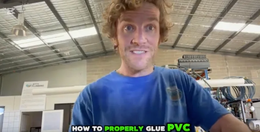Kyle Skalicky in the Jetty Plumbing workshop demonstrating PVC pipe jointing