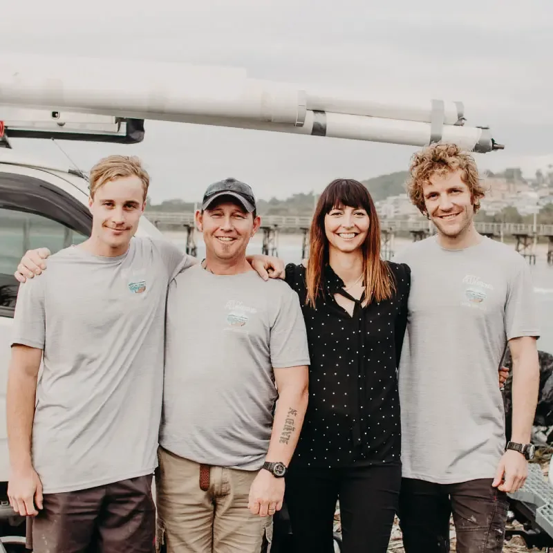 Jetty Plumbing team beside their vehicle, also featured on the live Emerald Beach page