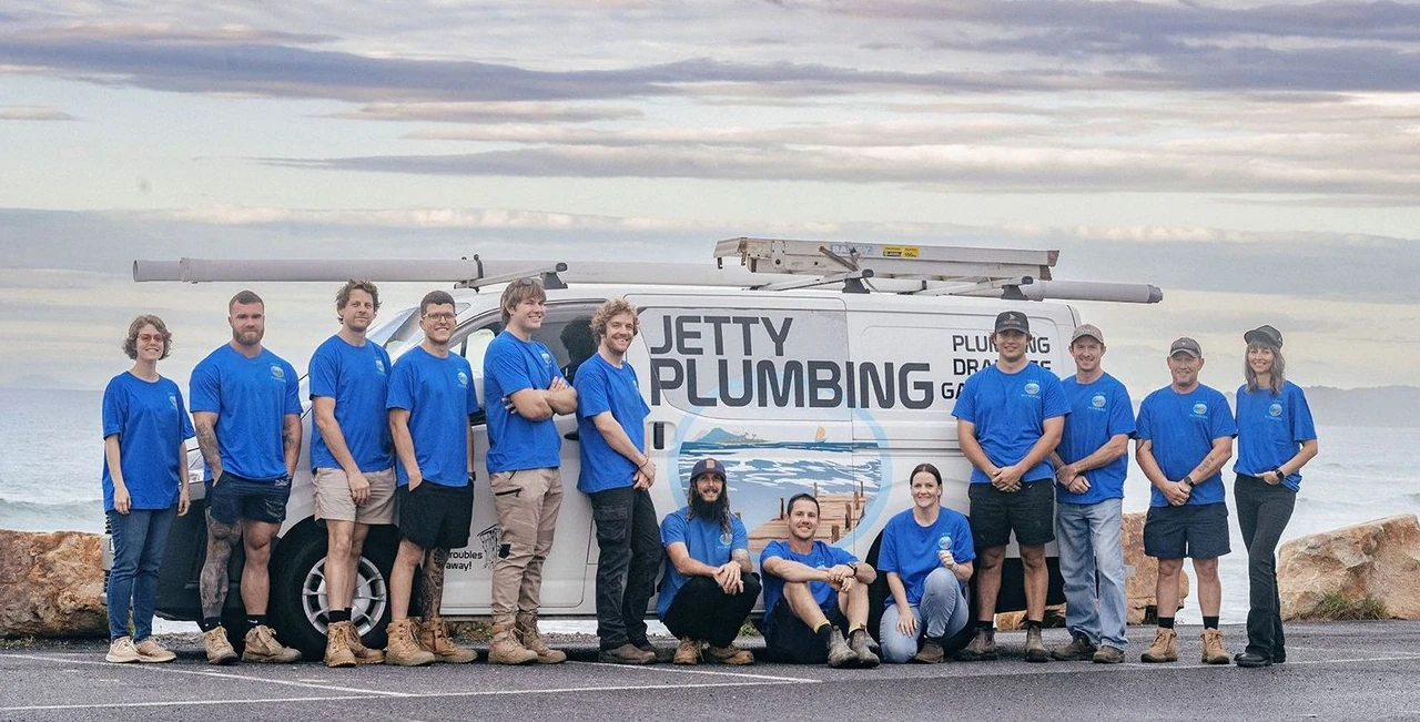 The Jetty Plumbing team beside their service van